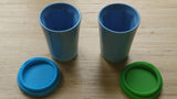 A pair of blue Therma cups