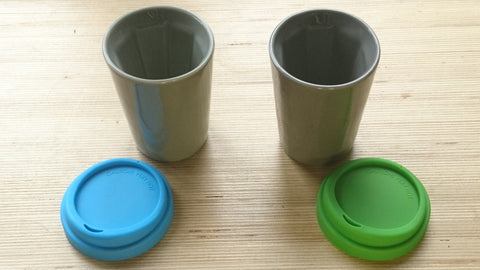 A pair of grey Therma cups