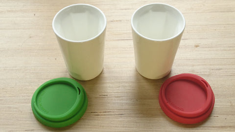 A pair of white Therma cups